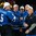 MALMO, SWEDEN - JANUARY 5: Finland's #5 Rasmus Ristolainen high-fives with equipment manager Janne Jansson after a victory over Sweden during gold medal action at the 2014 IIHF World Junior Championship. (Photo by Francois Laplante/HHOF-IIHF Images)